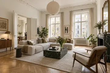 Living room with high ceilings and stucco